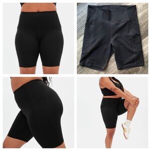 Girlfriend Collective Black High-Rise Pocket Bike Short, Size Large